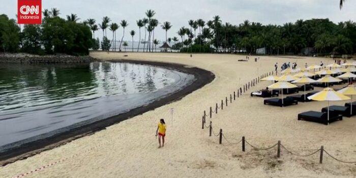 Berita Pantai Sentosa Singapura Ditutup usai Kena Tumpahan Minyak