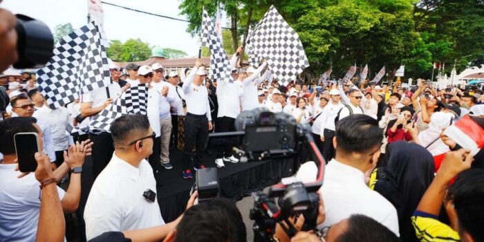 Berita Kapolri Hadiri Jalan Santai PWI, Tekankan Sinergi dengan Pers